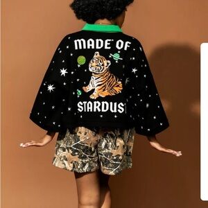 Dressed in LALA Black 'Made of Stardust' Top with Green Collar